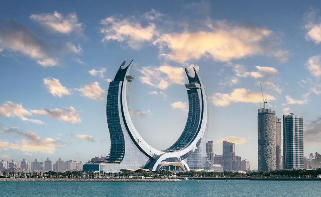 a large sculpture in the middle of a body of water